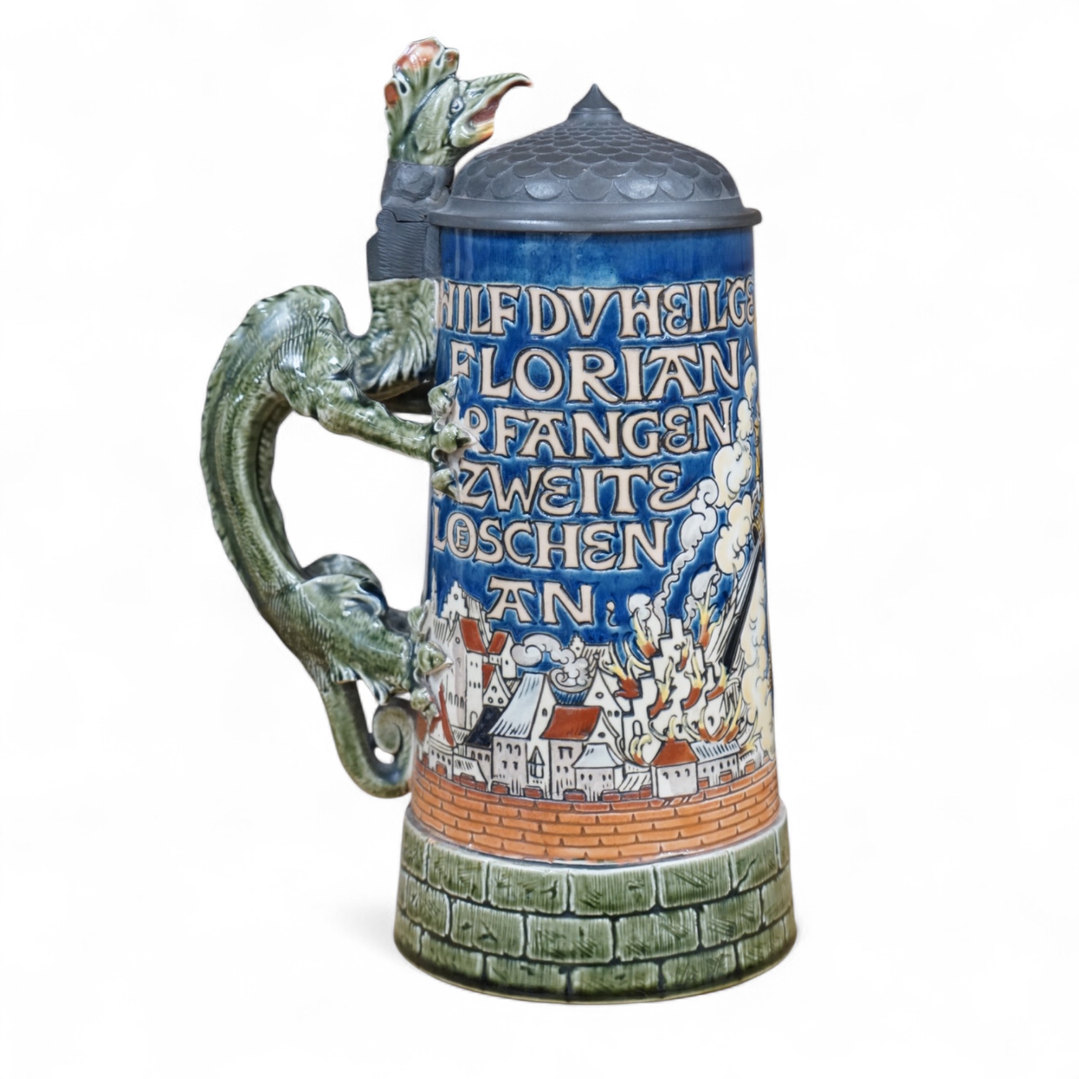 A Mettlach ‘ St Florian‘ stoneware stein, 27cm